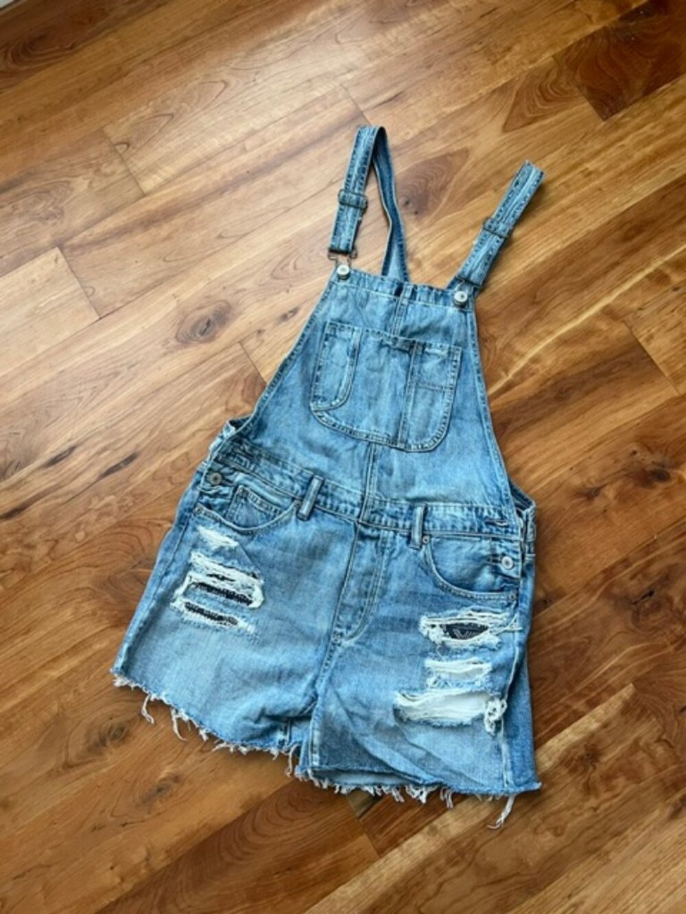 AE distressed overall shorts